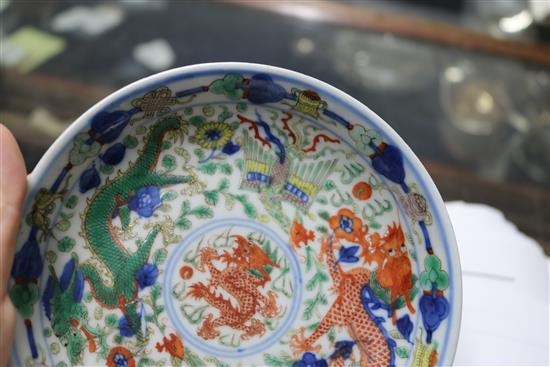 A Chinese wucai dragon and phoenix saucer dish, Kangxi mark, 19th century diameter 13.5cm